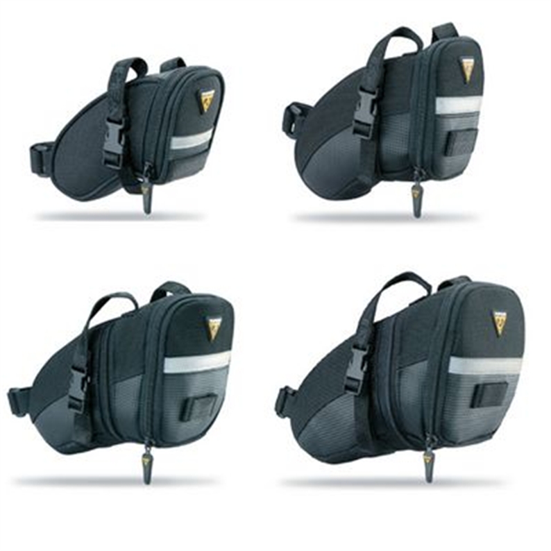 Aero shaped wedge pack with positive locking QR buckle and high strength straps. Large openings