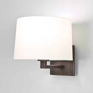 Azumi Bronze Wall Light With A Round Natural Coloured Fabric Shade