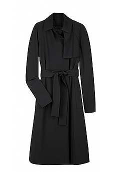 Black wool blend modern trench coat with press studs to fasten the front.