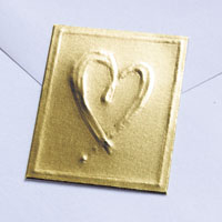 Confetti gold embossed heart seal
