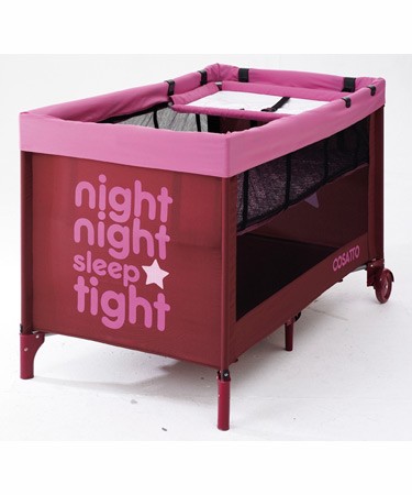 Pink travel cot with bassinette