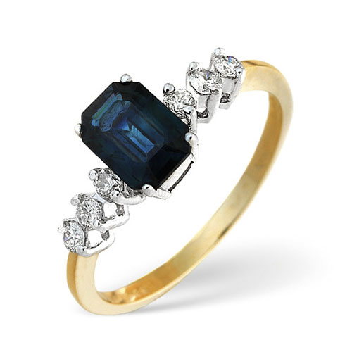 Emerald Cut Sapphire and 0.18 Diamond Ring In 9 Carat Yellow Gold