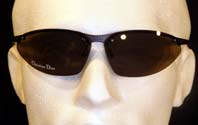 Black Tint Frameless Wrap-Around Sunglasses