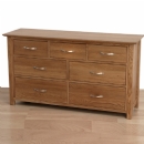 Metro dark solid oak 3 over 4 chest of drawers
