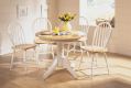 circular table and four windsor chairs