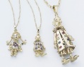 diamond and garnet-set clown pendant