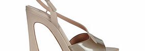 Beige patent leather asymmetric heels