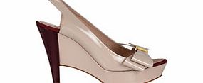 Beige patent leather bow slingbacks