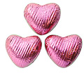 Novelty Chocolate Co. 100 Pale pink, foil wrapped, milk chocolate hearts