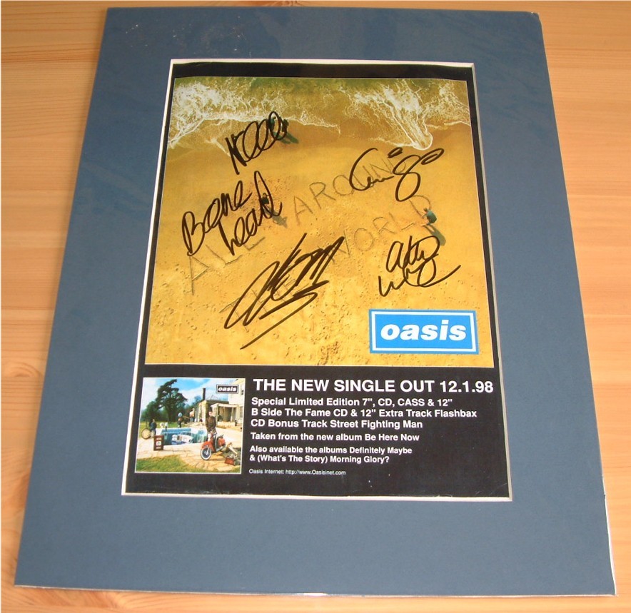 OASIS - GROUP SIGNED and MOUNTED MAG ADVERT PAGE