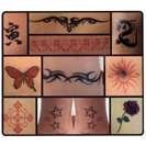 PAINLESS TATTOO PARLOUR KIT. WATER BASED TEMPORARY TATTOOS. Lasts a few days Wash off anytime