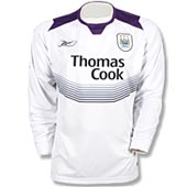 Manchester City Junior Long sleeve Away Shirt - White/Purple/Navy.