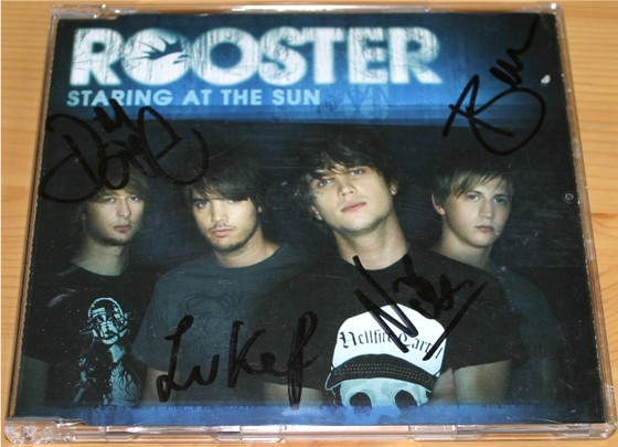 ROOSTER GROUP SIGNED STARING AT THE SUN CD