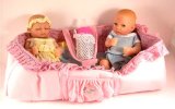 RSC Extremely cute boy and girl twin dolls complete with carry cot and extra clothes
