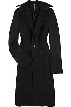 Black wool blend boucle tailored coat with an exaggerated lapel collar.