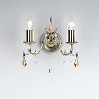 Antique brass plated wall fitting with dual purpose clip and candle bulb. Supplied with clear crysta