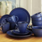This great value earthenware is finished by hand exclusively for us with a reactive blue glaze which