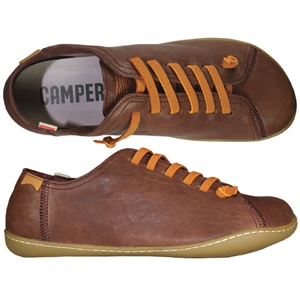 A unique casual from Camper. Features a single lace, knotted at either end, soft suede uppers and a 