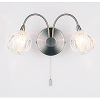 A stylish and modern switched wall light fitting in a satin chrome finish with clear moulded glass s