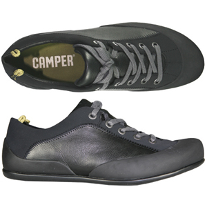 A fashionable trainer style from Camper. Features rubber toe and heel and unusual pull tabs.
