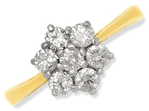 Seven diamonds (1/2ct total diamond weight) together create this lovely cluster ring with narrowed 1