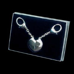 A superb anniversary gift. This 2 heart silver plated  keyring can have a name on each half
