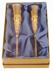 Add 2 Champagne flutes, engraved in gold leaf with Bride and Groom to your gift box