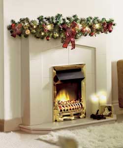 1.37m.Includes 13 decorations and 20 BS clear lights.220/240V 3-pin plug. For indoor use only