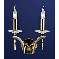 Antique brass finish wall fitting with sleek curved arms crystal sconces and droplets. Height - 34cm