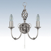 Ornate satin silver wrought iron wall fitting with swirl decoration. Height - 33cm Diameter - 29cmBu