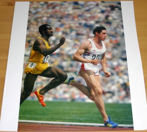 Signed in blue pen by the 1980 Olympic 100 metre champion Alan Wells. COA - 0480000042