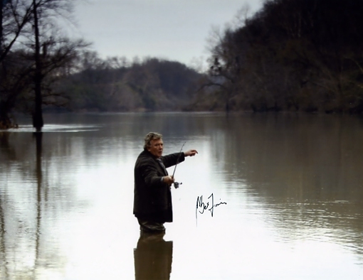 This superb colour photograph taken from the movie `Big Fish` has been signed in blue pen by