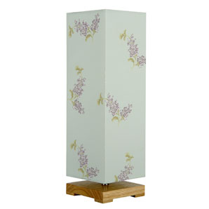 Short, square wooden base, topped with a duck egg blue column shade decorated with clusters of