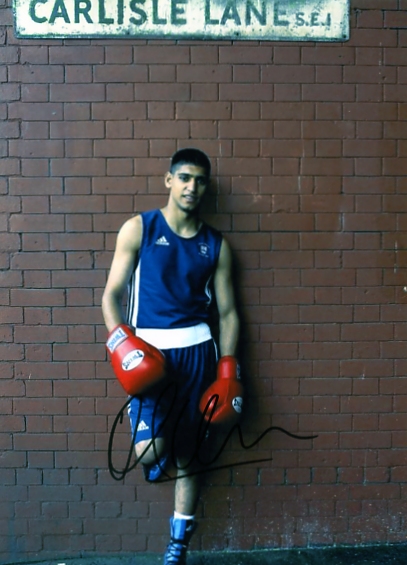 Great A4 sized colour photograph signed by the Olympic Silver Medallist Amir Khan in black pen