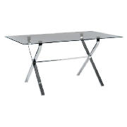 This Arctic dining table features a chrome frame supporting a glass top. This stylish, contemporary 