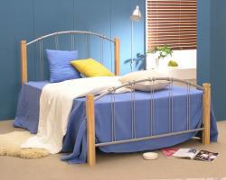 A modern bedstead comprising metal with wooden posts. An ideal bed for any member of the family and