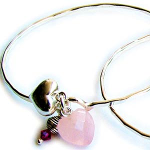 Azuni London Designer Jewellery 2005 Collection. A delicate silver bangle with a faceted Rose