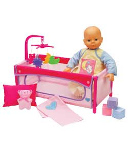 Travel cot and accessories set for doll. Doll not included. For ages 3 years and over.
