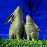 These adorable mother and baby moon-gazing hares are cast from iron for display indoors or outside. 