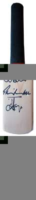 A great mini bat signed by four stars of world cricket; Phil Tufnell, Henry Olonga, Grant Flower and