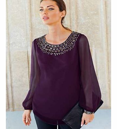 This sequin trim tunic makes an instant style splash, adding plenty of luxury to your glamorous evening look. Long sleeved with full body lining inside promises a smooth fit that flatters your shape, while the dramatic embellishment gives an elegant 