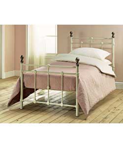 Ivory colour bedstead with antique brass colour finials.Metal frame.Comfort mattress.Overall size