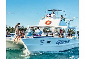 Enjoy a luxurious catamaran cruise along the Dominican Republics stunning coastline with snorkelling stops at a reef and an incredible underwater museum.