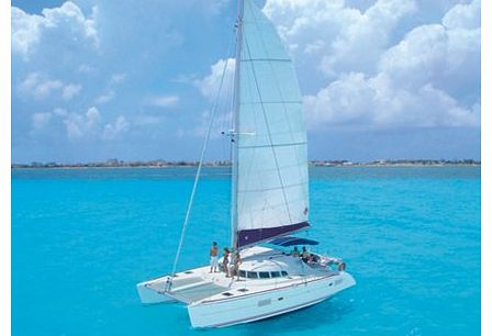 Catamaran Trip To Isla Mujeres - Intro Discover all the shades of blue of the beautiful Caribbean Sea as you sail on a catamaran trip to Isla Mujeres for a day of snorkelling swimming or dreaming the day away in a palm tree hammock on this idyllic fa