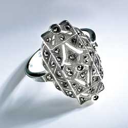 A design from the Belle poque in sterling silver, encrusted with dazzling marcasite