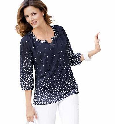 Charming tunic in sheer chiffon with a polka dot print, sparkling rhinestones on the trim of the rounded neckline, and hook fastening. With an adjustable spaghetti strap vest top for a wearable, opaque finish.Tunic Features: Three-quarter length elas