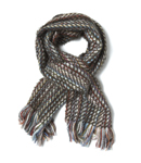 A long, chunky knit, multi-coloured scarf with long multi-colour fringes. 51 acrylic, 28 polypropyle