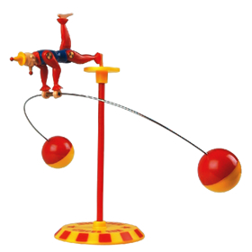 With a little patience and practice the clown can be made to balance and even spin on the podium in