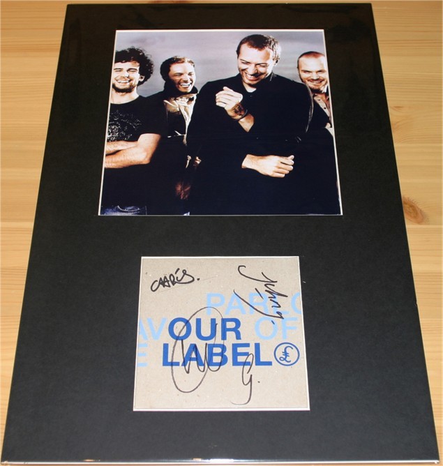 Coldplay promotional CD signed by Chris  Guy  Will and Jon and professionally mounted alongside a