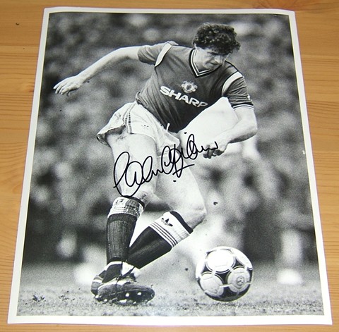 Signed by former Manchester United star Colin Gibson in black pen. Certificate of Authenticity no